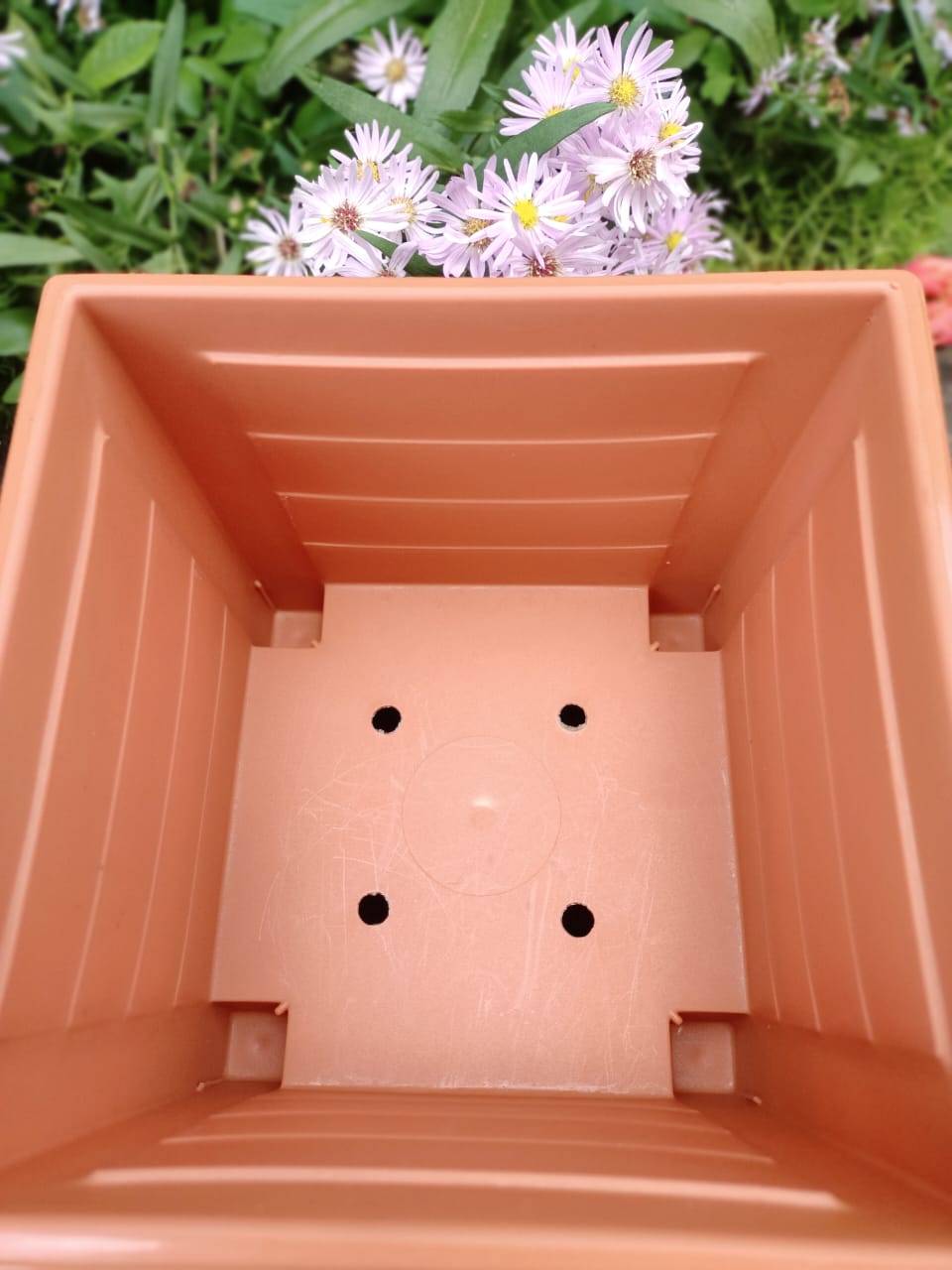 Kenpoly Square Planter No. 4 – drainage holes at base