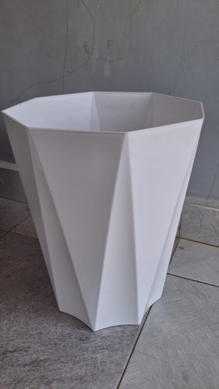 Actual tall white faceted geometric plant pot from front angle