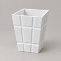 AI-generated square illustration of white grid-pattern planter from front angle